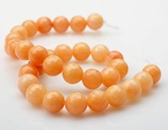 Jadeit  pomarańczowy fasetow. kule 12 mm  - sznur