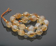 Cytryn  fasetowane oliwki - sznur 19 cm