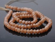 Jadeit  fasetow. oponki  4 mm - sznur (siena)