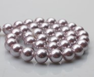 Perła muszlowa kule 10 mm - sznur ( lilaróż )